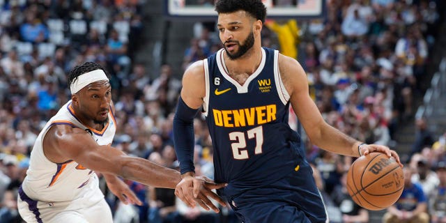 Jamal Murray heads to the basket