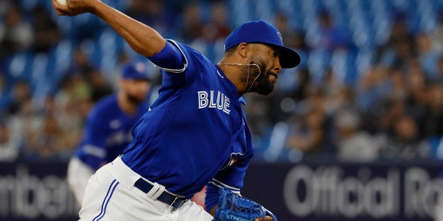 Jay Jackson throws a pitch