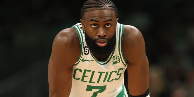 Jaylen Brown looks on
