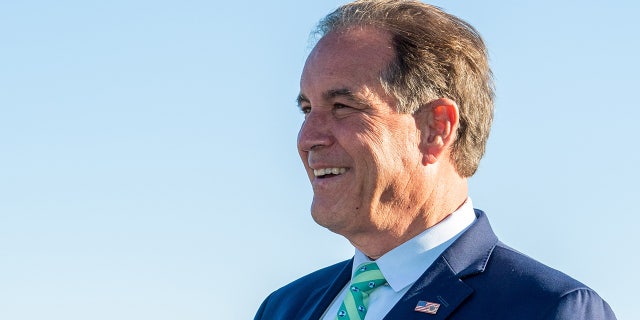 Jim Nantz during the final round of a golf tournament
