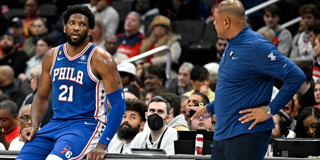 Joel Embiid talks to Doc Rivers