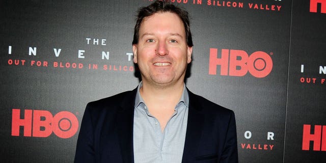 John Carreyrou on red carpet