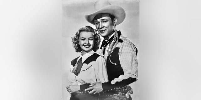 Julie Rogers and Dale Evans posing together in cowboy gear