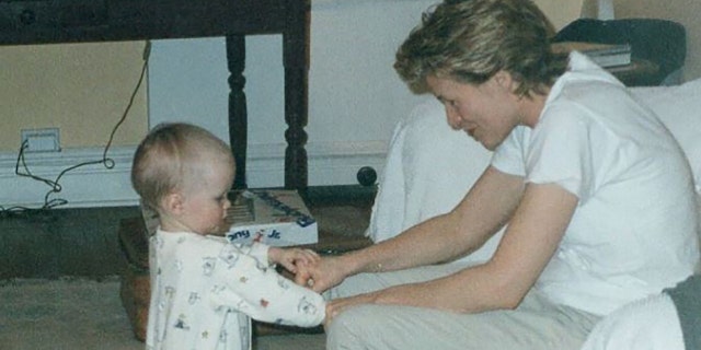 Kim Basinger with baby Ireland