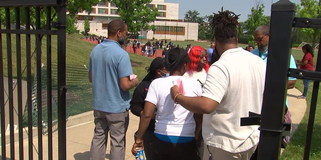 students and staff outside school