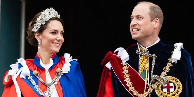 Kate Middleton and Prince Harry appear on the balcony