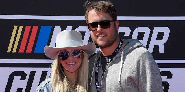 Kelly and Matthew Stafford at a NASCAR race