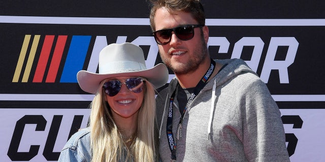 Kelly and Matthew Stafford at a NASCAR race