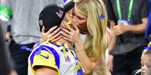 Kelly Stafford kisses Matthew