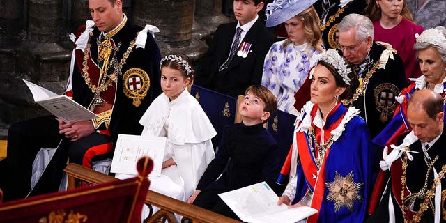 The Prince of Wales, Princess Charlotte, Prince Louis, the Princess of Wales and the Duke of Edinburgh at the coronation ceremony of King Charles III and Queen Camilla in Westminster Abbey, London