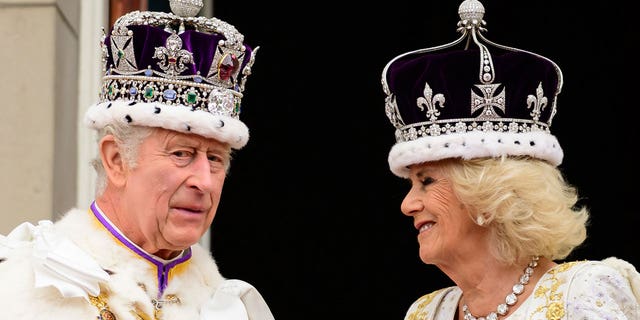 King Charles and Queen Camilla wearing crowns