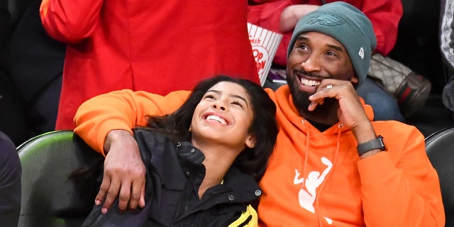 Kobe and Gianna Bryant laugh