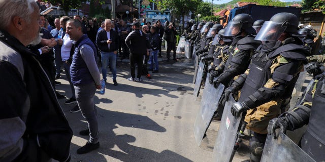 Kosovo police, NATO peacekeepers clash with Serb protesters as tensions in the region escalate Kosovo Serbs Clashes