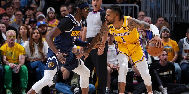 D'Angelo Russell dribbles the ball