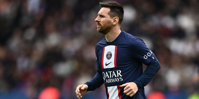 Lionel Messi runs