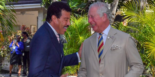 King Charles and Lionel Richie laughing together in Barbados