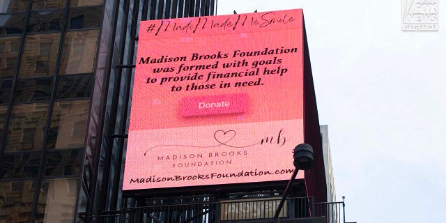 A billboard for the Madison Brooks Foundation is seen on display in Times Square