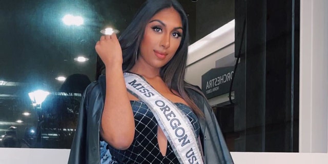 Manju Bangalore posing with her Miss Oregon sash