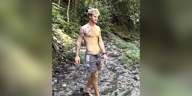 Daniel Penny on a hiking trail.