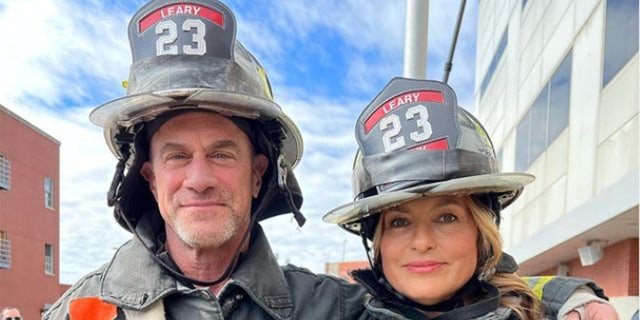 Mariska Hargitay and Christopher Meloni dressed in firefighter gear