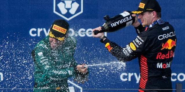 Max Verstappen sprays Fernando Alonso