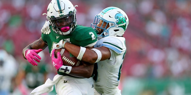 Michel Dukes tackled