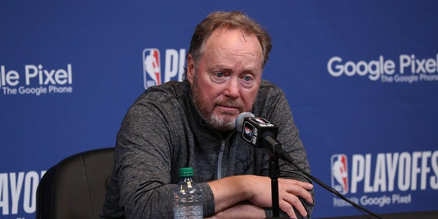 Mike Budenholzer at a press conference