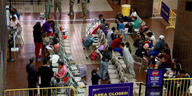 Recently arrived Migrants are pictured in the processing area at Port Authority Bus Terminal in Midtown Manhattan