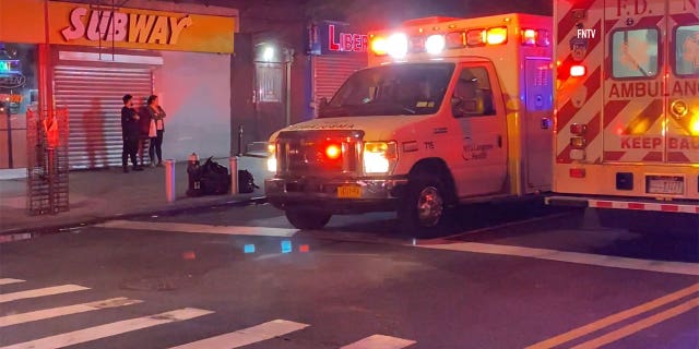 Two NYC police officers struck and dragged by fleeing vehicle: NYPD 3 Ambulance driving down the street in front of a Subway.