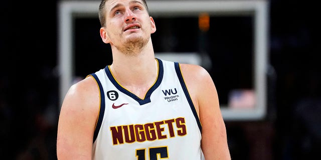 Nikola Jokic looks up