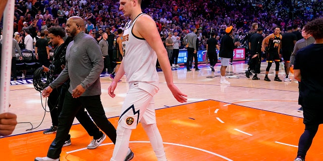 Nikola Jokic leaves the court