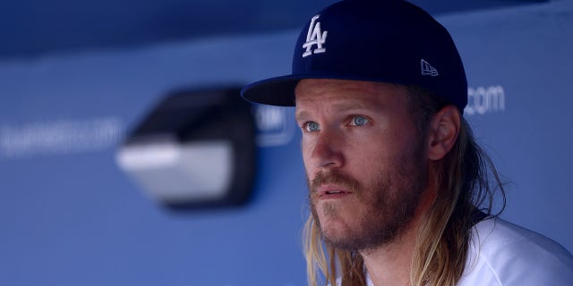 Noah Syndergaard looks on from the bench