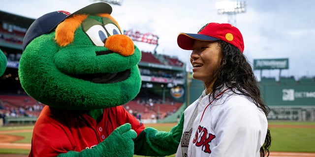 Olivia Pichardo with the Red Sox mascot