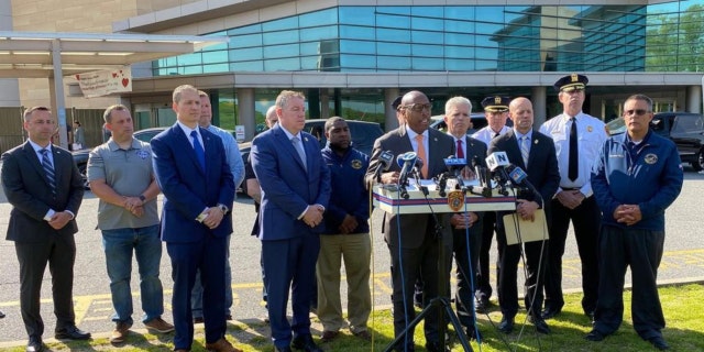 A press conference in front of Stony Brook University Hospital.