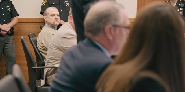 Michael Slager looking towards the camera while on trial