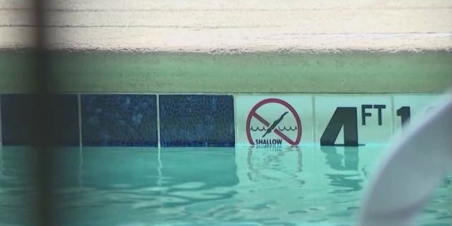 Pool sign at Phoenix hotel where child drowned