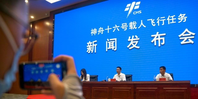 A press conference at the Jiuquan Satellite Launch Center