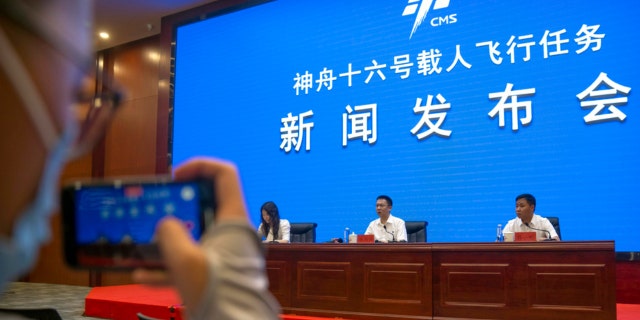 A press conference at the Jiuquan Satellite Launch Center