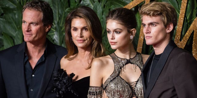 Rande Gerber and Cindy Crawford along with their kids