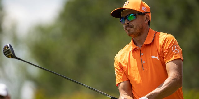 Rickie Fowler looks at shot