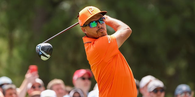 Rickie Fowler finishes the swing