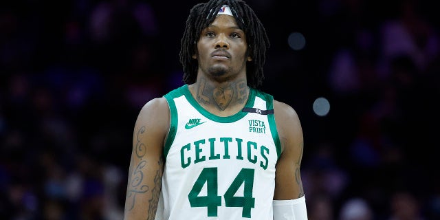 Robert Williams looks on court