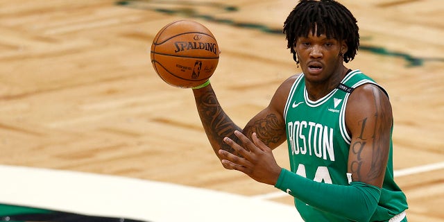 Robert Williams looks to pass