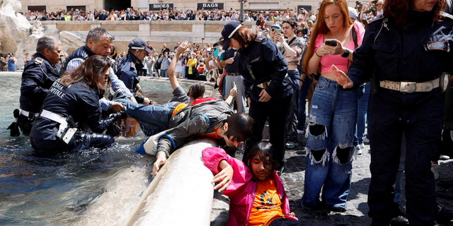 Italian police arrest Trevi Fountain protesters