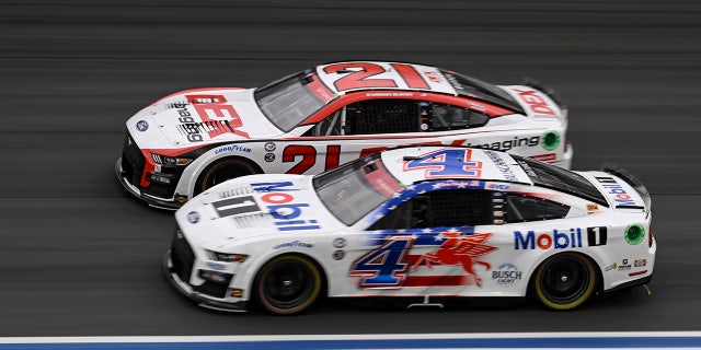 Kevin Harvick competes for the position