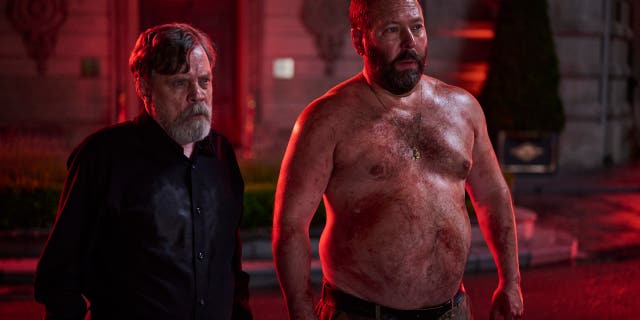 Mark Hamill and Bert Kreischer shirtless in a scene from The Machine