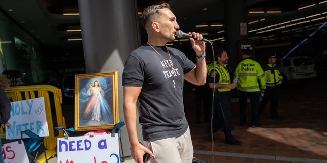 Street preacher outside SatanCon