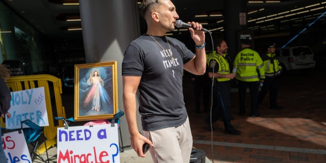 Street preacher outside SatanCon