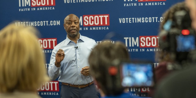 Senator Tim Scott speaks to reporters