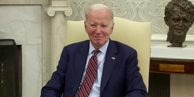 President Biden smiles